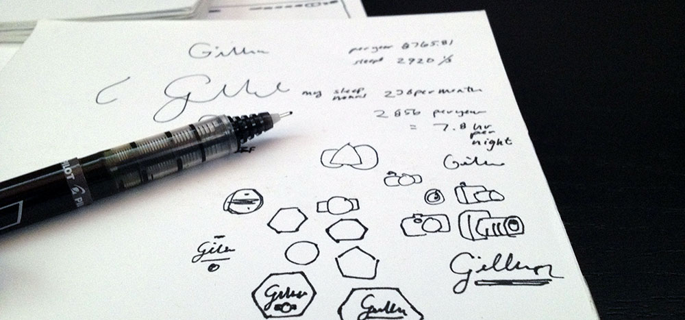 Pen on paper with sketches and calculations.
